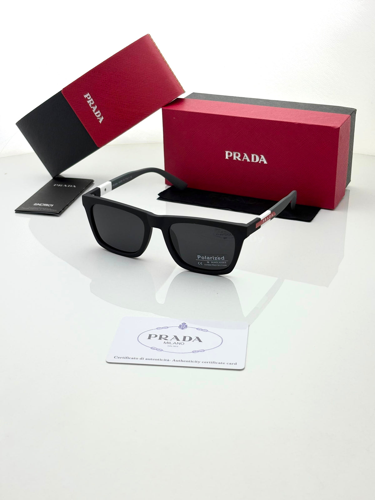 Prada 30351 grey black polarized lens