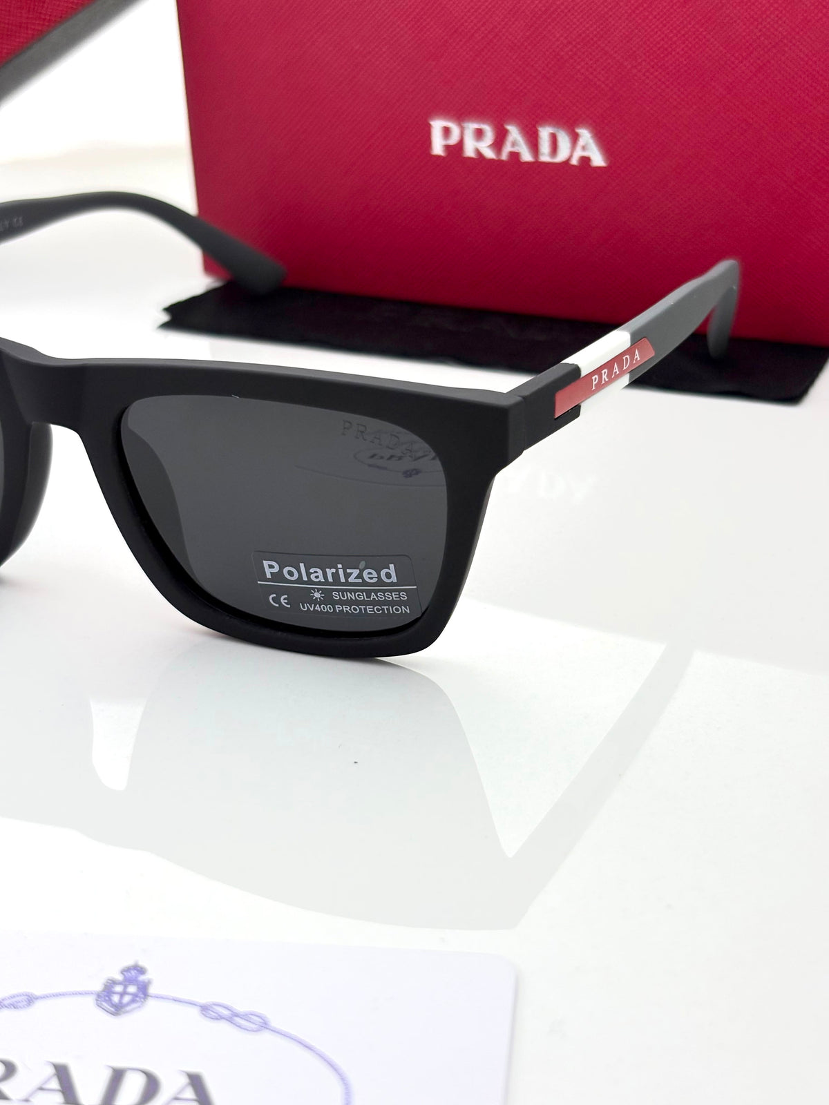 Prada 30351 grey black polarized lens