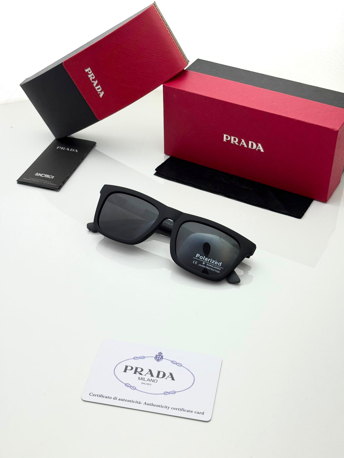 Prada 30351 grey black polarized lens