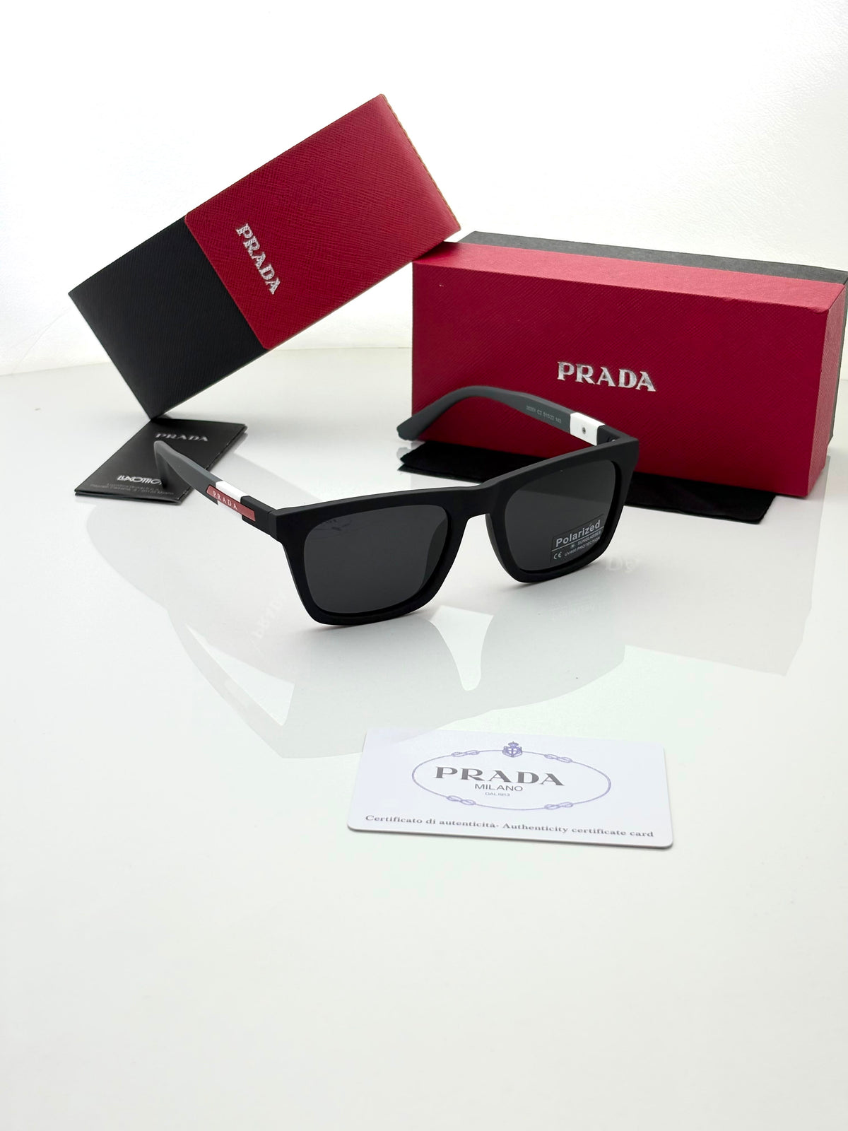 Prada 30351 grey black polarized lens